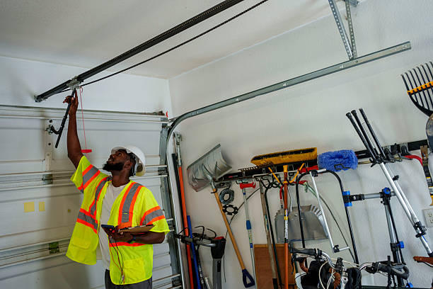Professional Garage Door Panel Replacement technician working in Dansville, NY